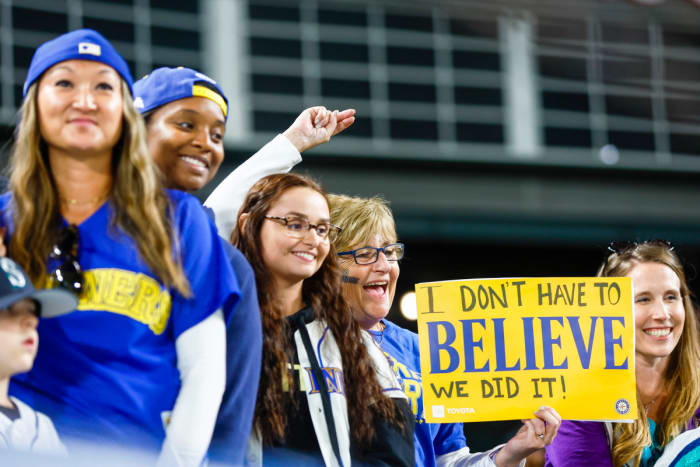 Sep 30, 2022; Seattle, Washington, USA; Seattle Mariners fans cheer following a 2-1 victory against the Oakland Athletics to clinch a wild card playoff berth at T-Mobile Park.